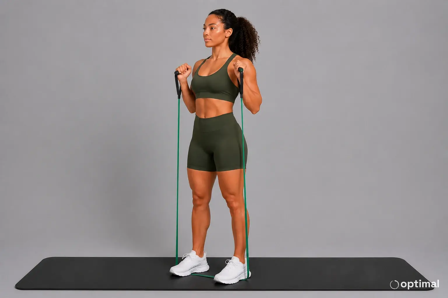 Band squat start position standing with the band held at shoulder height